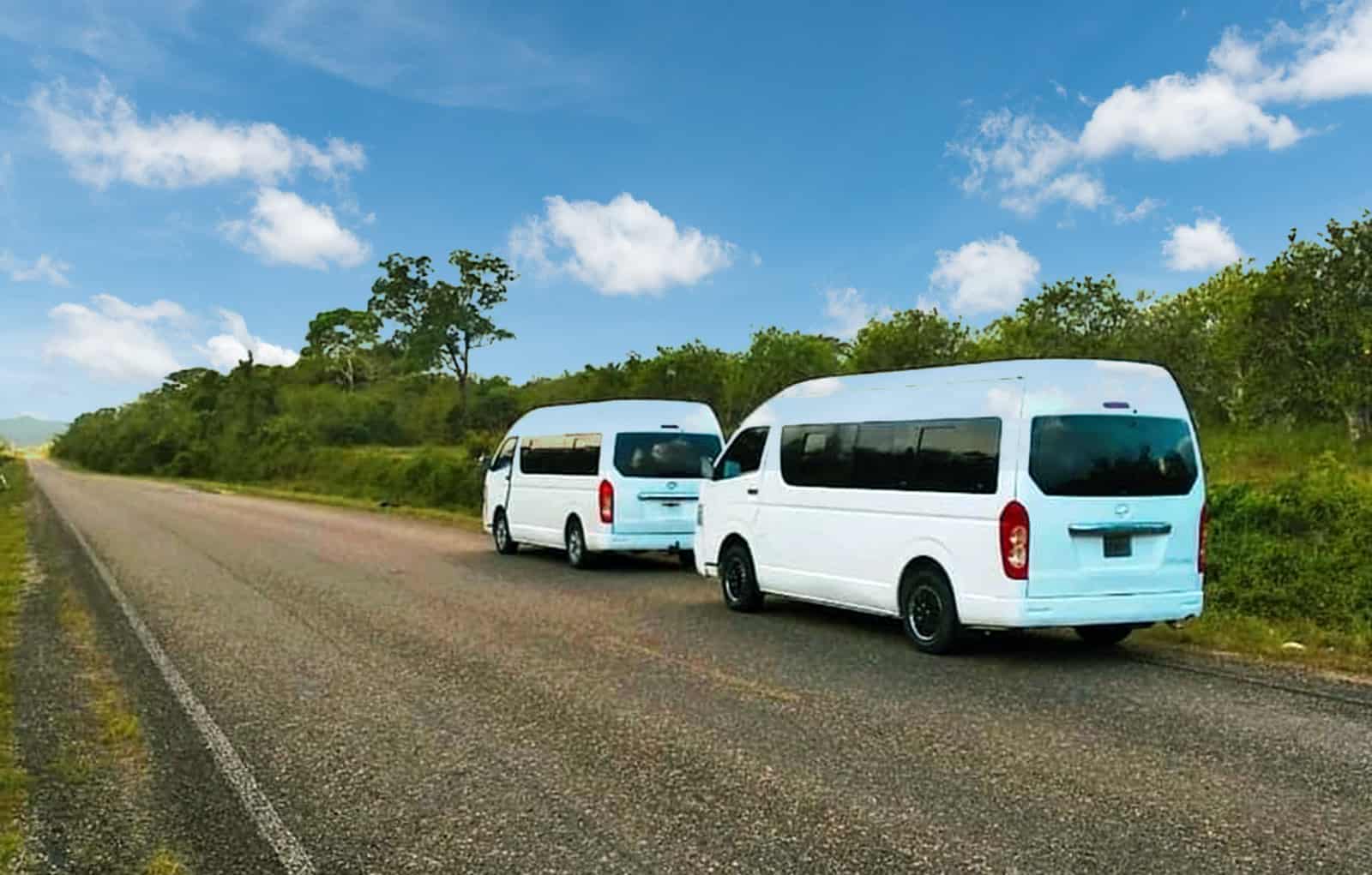 untame belize shuttles and transfers to toyota vans on the road