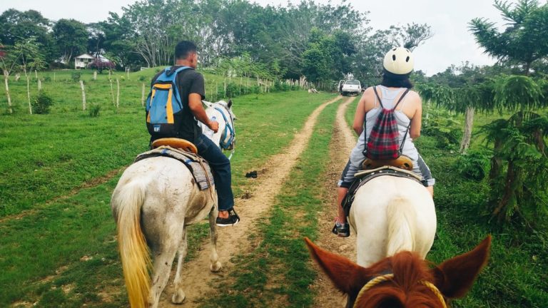 untame belize horseback riding tours couple
